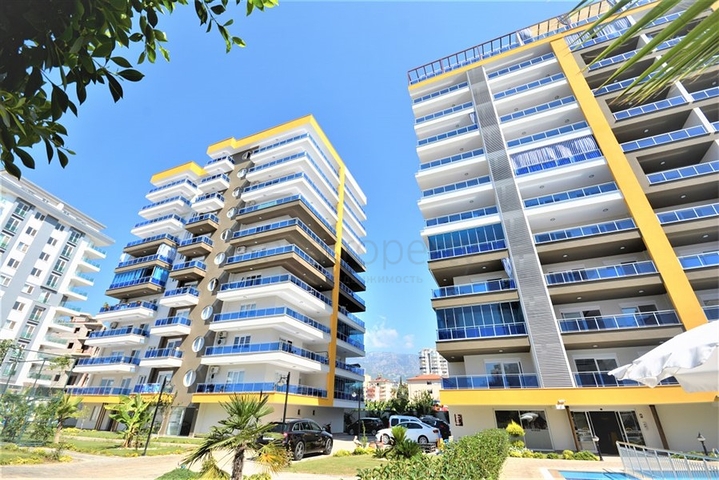 Трехкомнатная квартира с отдельной кухней в Махмутларе