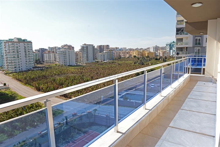 Трехкомнатная квартира с отдельной кухней в Махмутларе