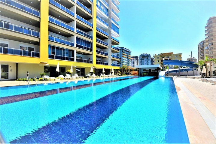 Трехкомнатная квартира с отдельной кухней в Махмутларе