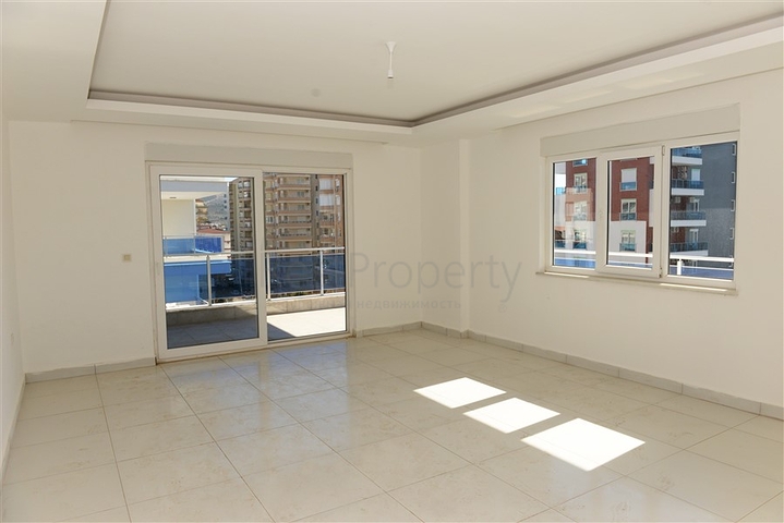 Трехкомнатная квартира с отдельной кухней в Махмутларе