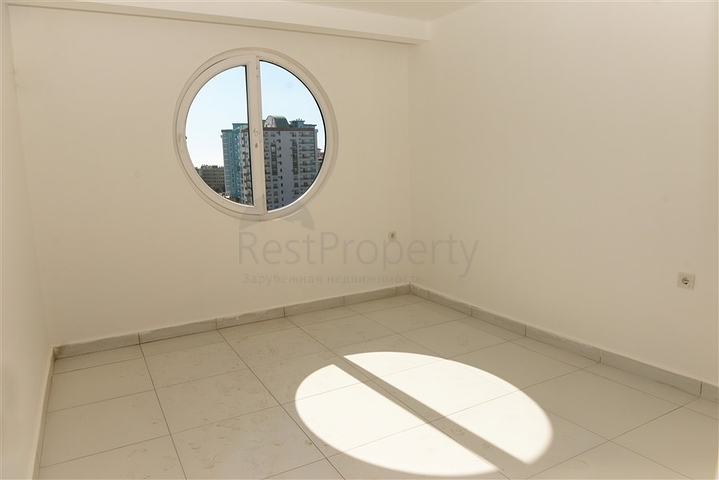 Трехкомнатная квартира с отдельной кухней в Махмутларе