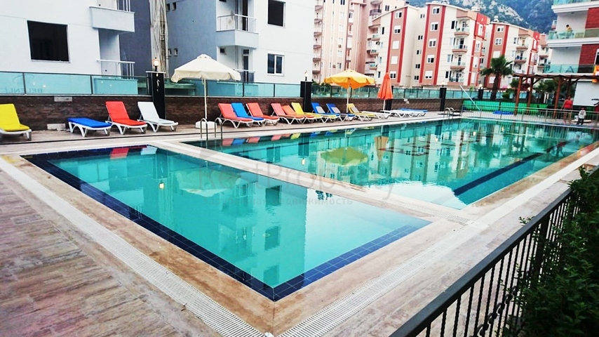 Квартира 1+1 в комплексе 800 м до моря в Коньяалты