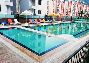 Квартира 1+1 в комплексе 800 м до моря в Коньяалты