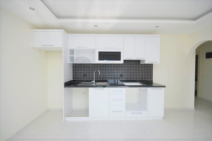 Квартира с одной спальной комнатой в районе Махмутлар