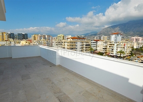 Меблированный пентхаус с видом на море в Махмутларе