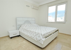 Меблированный пентхаус с видом на море в Махмутларе