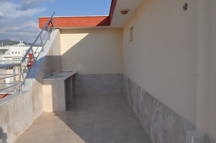 Пентхаус с четырьмя спальными комнатами в Махмутларе