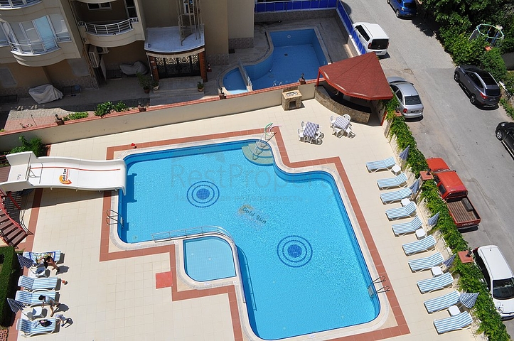 Пентхаус с четырьмя спальными комнатами в Махмутларе