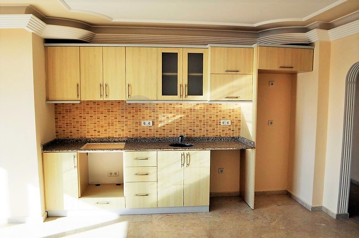 Пентхаус с четырьмя спальными комнатами в Махмутларе