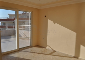 Пентхаус с четырьмя спальными комнатами в Махмутларе