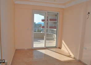 Пентхаус с четырьмя спальными комнатами в Махмутларе