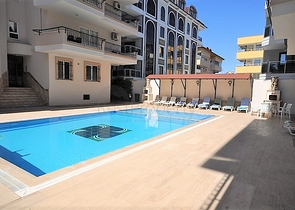 Трехкомнатная квартира с мебелью в районе Оба