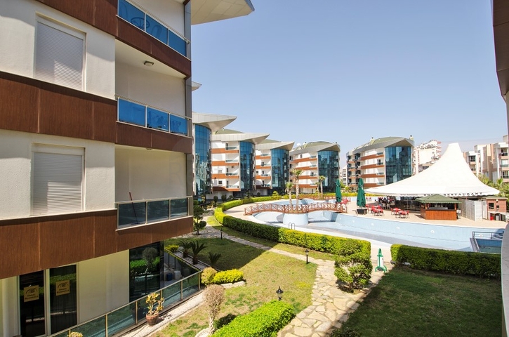 Квартира 2+1 с мебелью в комплексе отельного типа в Анталии