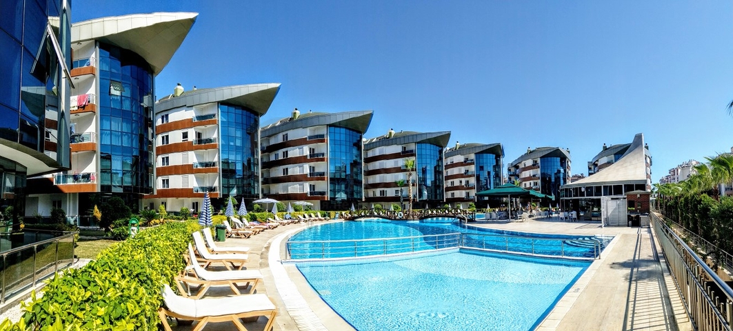 Квартира 2+1 с мебелью в комплексе отельного типа в Анталии