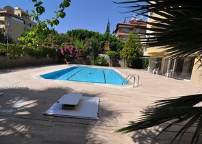 Меблированная квартира с одной спальней в Оба