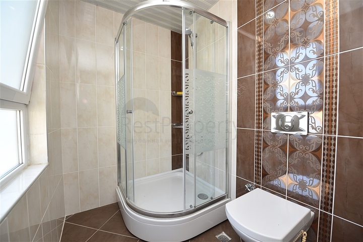 Пентхаус с четырьмя спальнями в районе Махмутлар