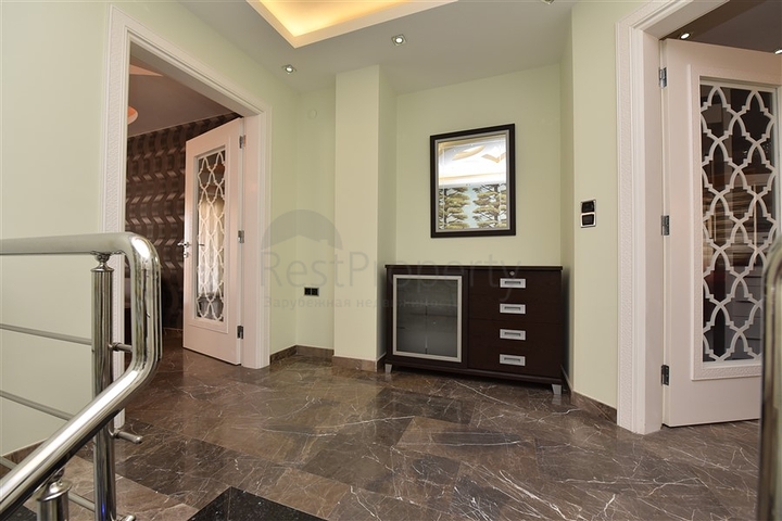 Пентхаус с четырьмя спальнями в районе Махмутлар