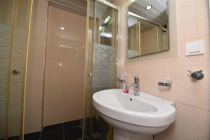 Пентхаус с четырьмя спальнями в районе Махмутлар