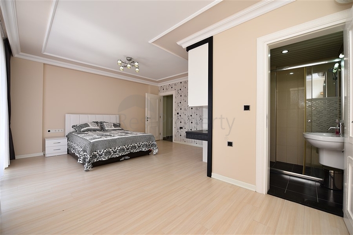 Пентхаус с четырьмя спальнями в районе Махмутлар