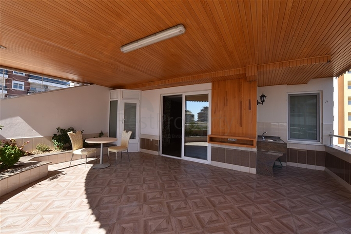 Пентхаус с четырьмя спальнями в районе Махмутлар