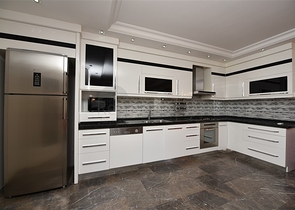 Пентхаус с четырьмя спальнями в районе Махмутлар