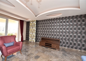 Пентхаус с четырьмя спальнями в районе Махмутлар