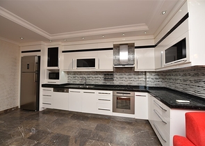 Пентхаус с четырьмя спальнями в районе Махмутлар