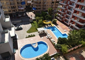 Пентхаус с четырьмя спальнями в районе Махмутлар