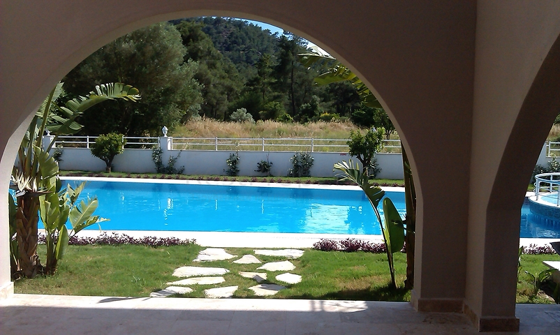 Квартира 1+1 с мебелью в Чамьюва Кемере 