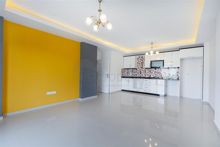 Трёхкомнатная квартира в районе Махмутлар рядом с морем