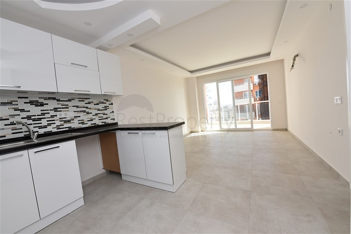 Комфортная двухкомнатная квартира в Махмутларе