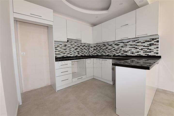 Комфортная двухкомнатная квартира в Махмутларе