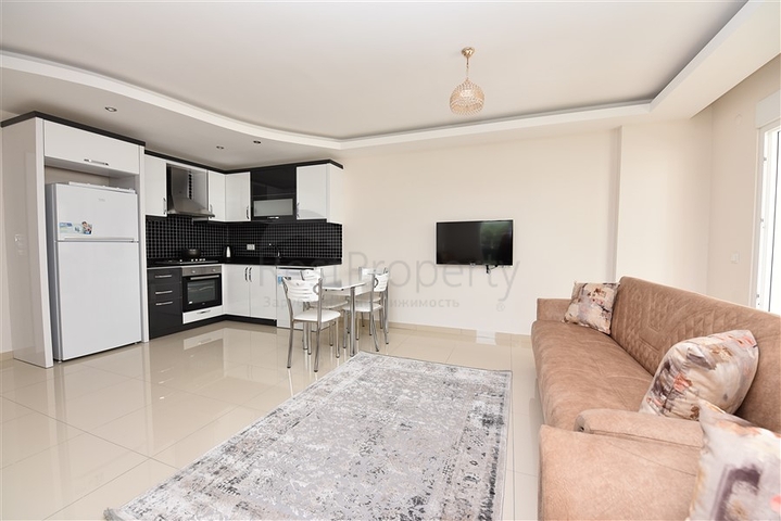  Квартира 1+1 в Махмутларе, рядом с морем