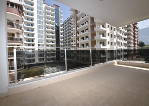  Квартира 1+1 в Махмутларе, рядом с морем