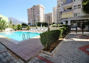  Квартира 1+1 в Махмутларе, рядом с морем