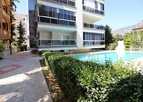  Квартира 1+1 в Махмутларе, рядом с морем