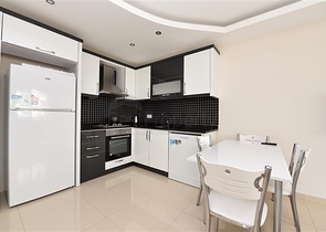  Квартира 1+1 в Махмутларе, рядом с морем