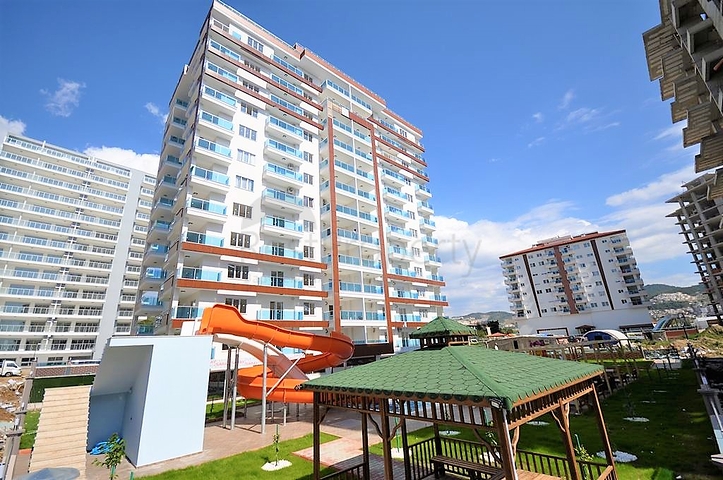 Апартаменты 1+1 в современном комплексе в Махмутларе