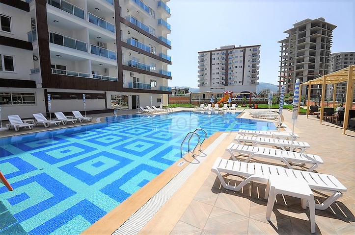 Апартаменты 1+1 в современном комплексе в Махмутларе