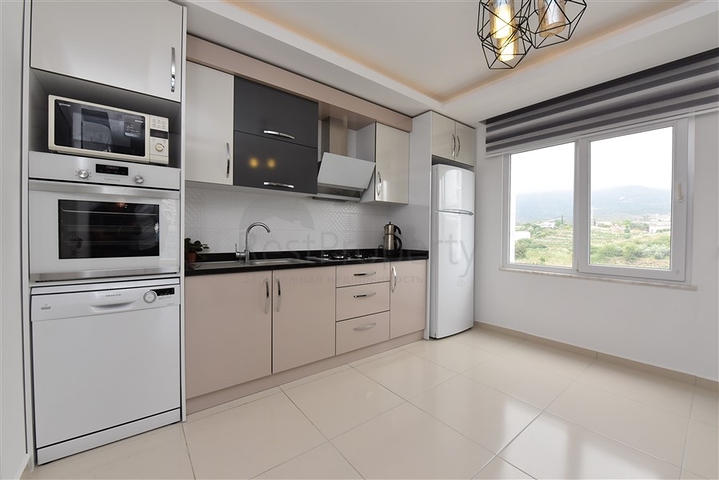 Апартаменты 1+1 в современном комплексе в Махмутларе