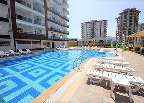 Апартаменты 1+1 в современном комплексе в Махмутларе