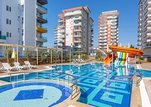 Апартаменты 1+1 в современном комплексе в Махмутларе