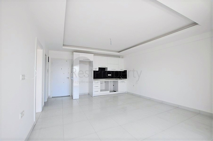 Просторная двухкомнатная квартира в Алании с отличной инфраструктурой