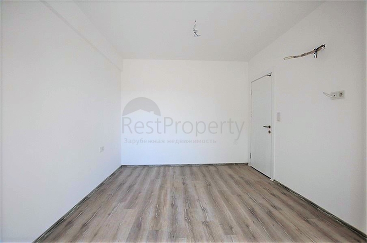 Просторная двухкомнатная квартира в Алании с отличной инфраструктурой