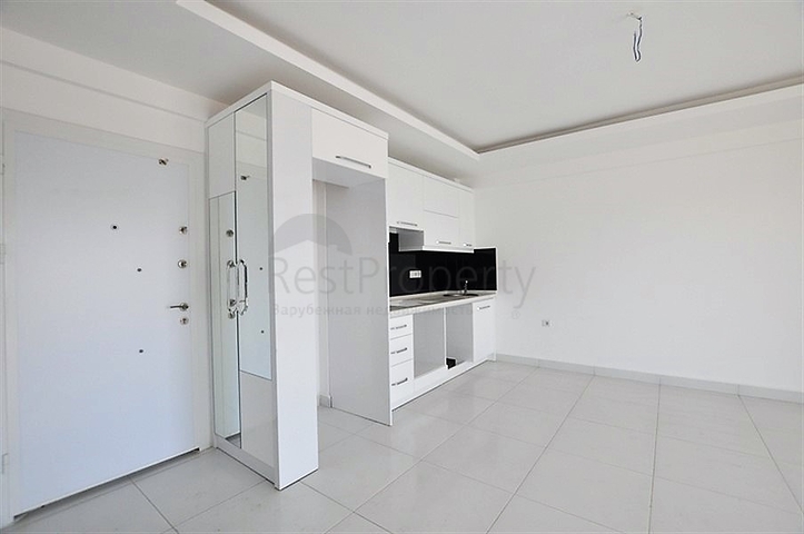 Просторная двухкомнатная квартира в Алании с отличной инфраструктурой