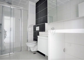 Просторная двухкомнатная квартира в Алании с отличной инфраструктурой