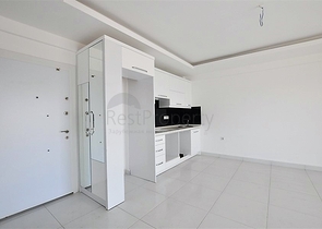 Просторная двухкомнатная квартира в Алании с отличной инфраструктурой