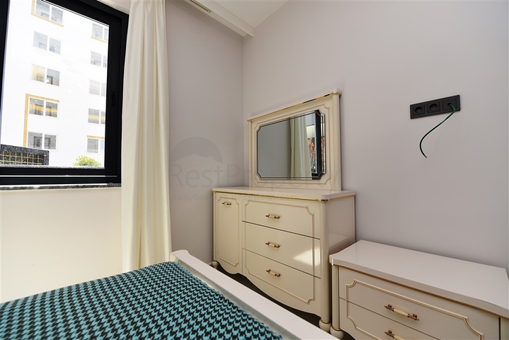 Квартира 2+1 с большой террасой в новом комплексе в Махмутларе