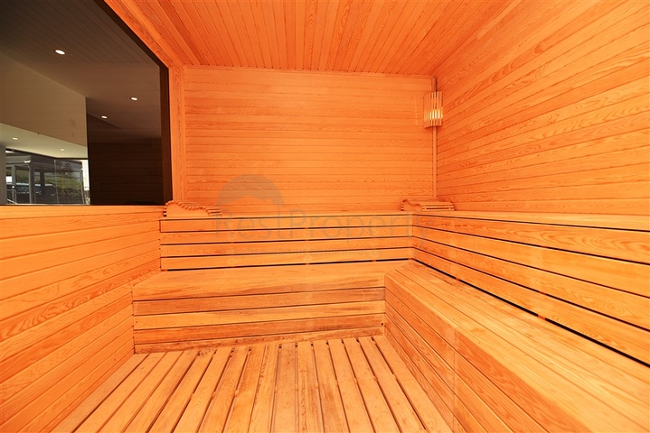 Квартира 2+1 с большой террасой в новом комплексе в Махмутларе