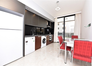 Квартира 2+1 с большой террасой в новом комплексе в Махмутларе